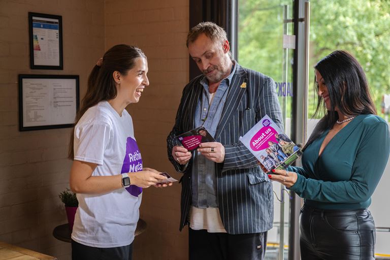 Woman In Rethink Tshirt Talking